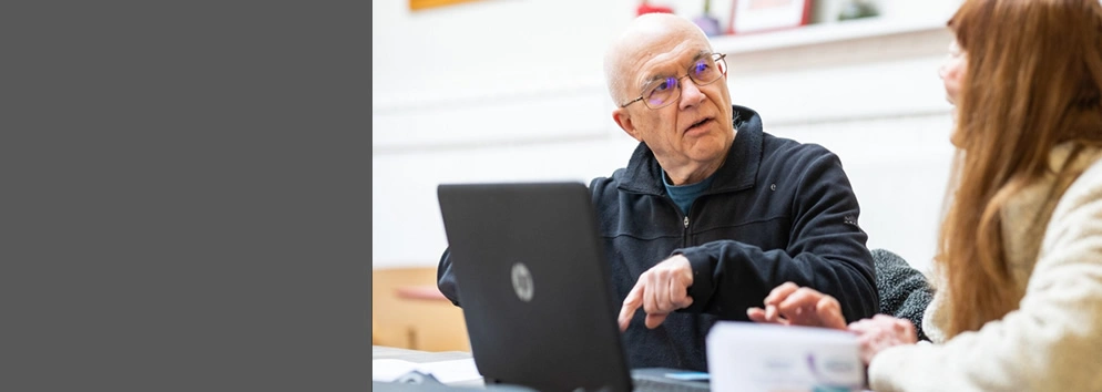 Man and woman with laptop